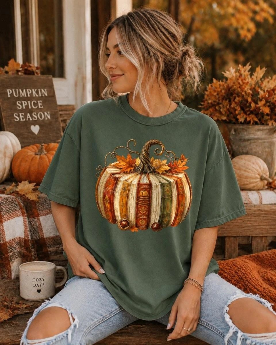 Fall lifestyle — model in fall setting with pumpkins wearing JM Chic tee